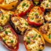Air fryer cream cheese stuffed mini peppers topped with herbs