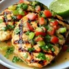 Delicious Applebee's Fiesta Lime Chicken served with lime and fresh toppings