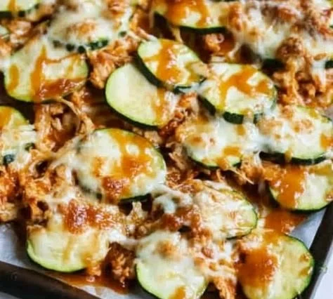 Cheesy BBQ Chicken Zucchini Nachos topped with fresh ingredients