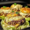 Crispy cabbage burger bake served on a plate with fresh vegetables
