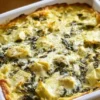 High protein spinach artichoke bake served in a dish