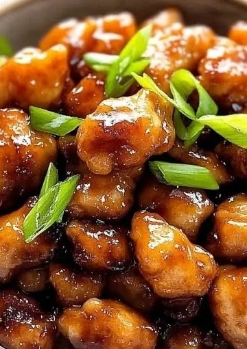 Delicious Honey Butter Chicken served with golden drizzle and crispy edges