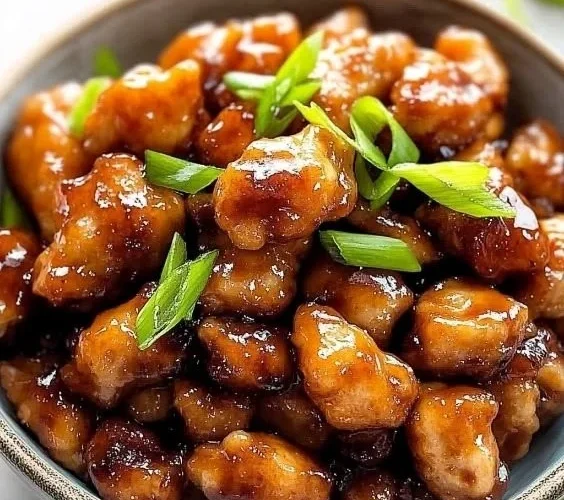 Delicious Honey Butter Chicken served with golden drizzle and crispy edges