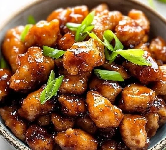 Delicious Honey Butter Chicken served with golden drizzle and crispy edges