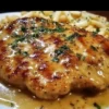 Longhorn Steakhouse Parmesan Chicken served with sides
