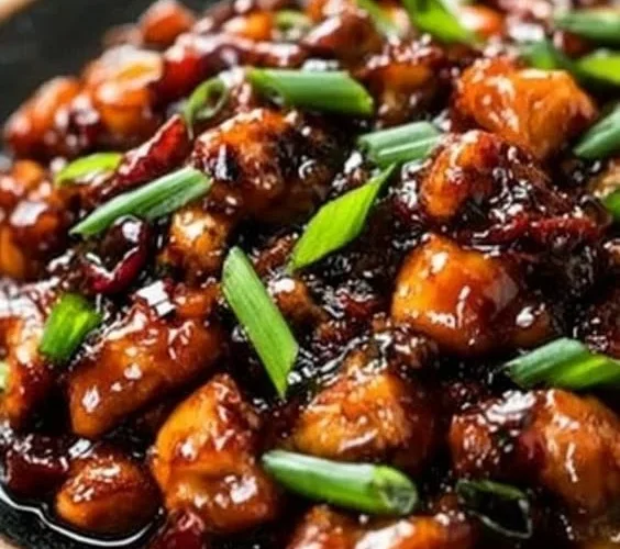 Plate of Sweet Savory Mongolian Chicken with colorful vegetables