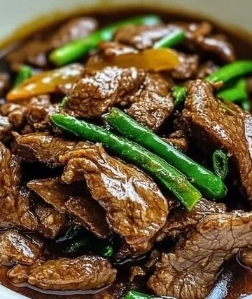 Slow cooker Mongolian beef served with rice and vegetables.