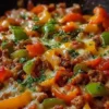 Delicious unstuffed pepper skillet with colorful vegetables and spices.