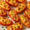 Air Fryer cream cheese stuffed mini peppers garnished and ready to serve