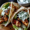 Delicious Chicken Gyros wrapped with fresh vegetables and herbs