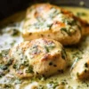 Creamy poblano chicken dish served with rice and fresh vegetables