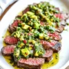 Delicious skirt steak served with avocado chimichurri sauce
