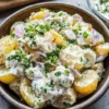 Sour cream and onion potato salad served in a bowl
