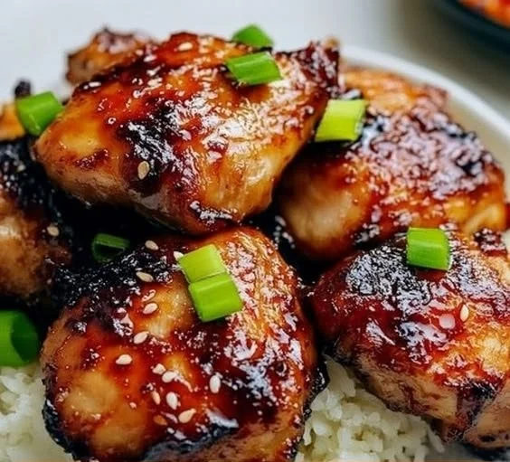 Crispy Sweet Chili Air Fryer Chicken Thighs served on a plate